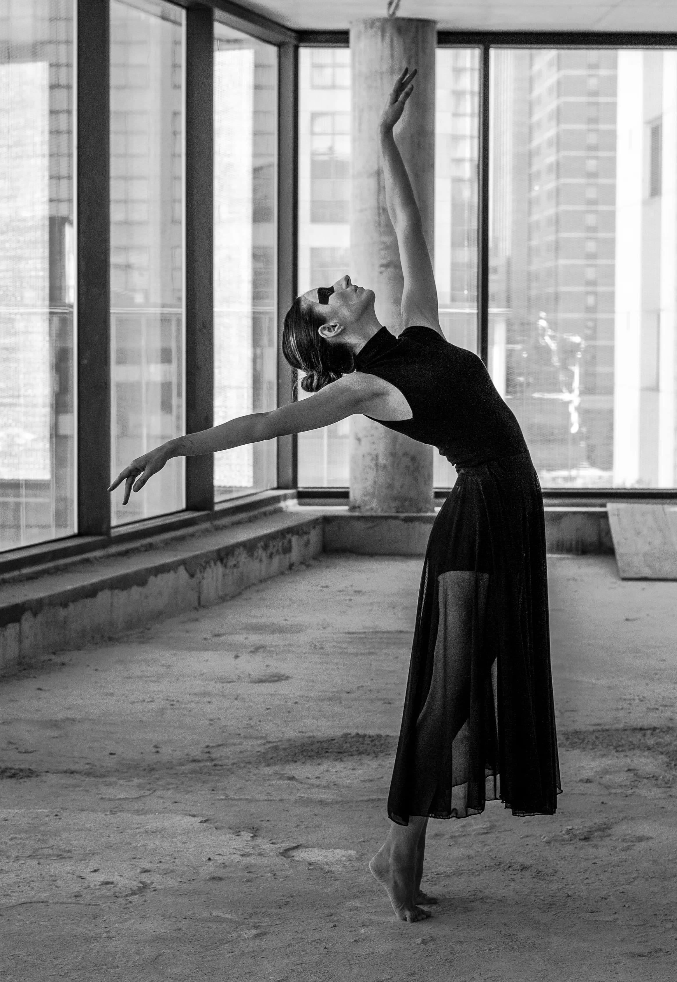 Dancer in front of IXOU architecture